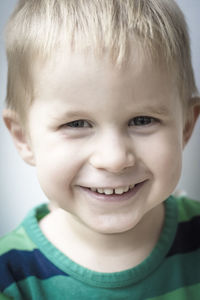 Close-up portrait of smiling boy