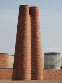 Low angle view of modern building against sky