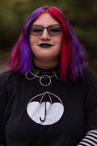 Portrait of young woman with long blond hair
