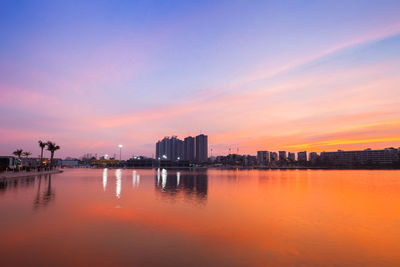 Scenic view of sea against romantic sky at sunset