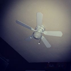 Electric lamp in illuminated room