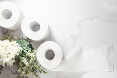 High angle view of white flowers on table