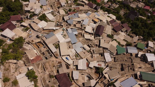 High angle view of houses and buildings in town