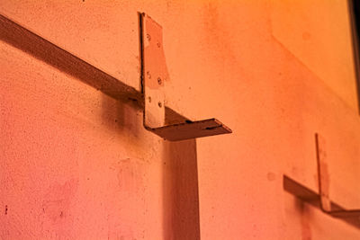 Low angle view of orange wall