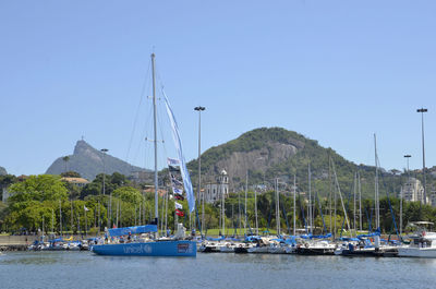 Boats moored in sea