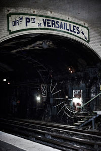 Train at railroad station at night