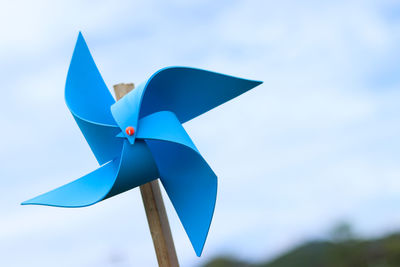 Close-up of toy against blue sky