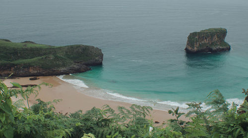 High angle view of rocks in sea