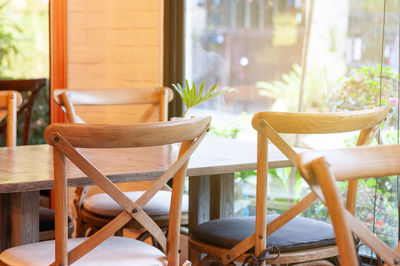 Empty chairs and table in cafe