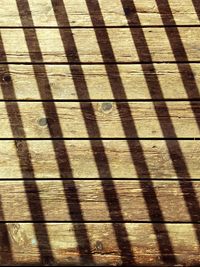 Full frame shot of shadow on tiled floor