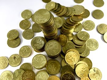 High angle view of coins