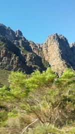 Scenic view of mountains against clear sky