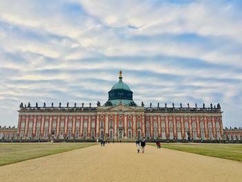 Facade of historic building against sky