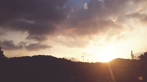 Sun shining through clouds