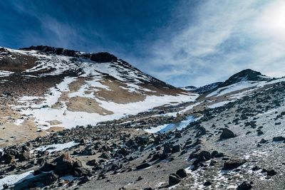 Scenic view of snowcapped mountains against sky