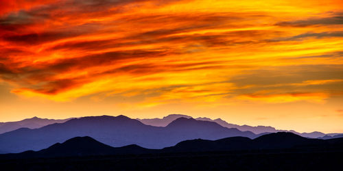 Scenic view of mountains at sunset