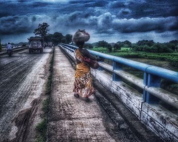 Road against cloudy sky