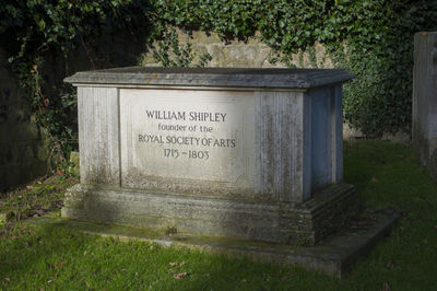 Text on stone at cemetery