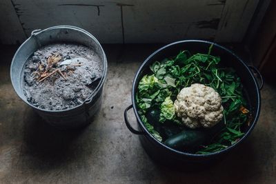 High angle view of raw vegetables in container at home