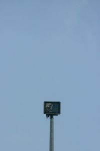 Low angle view of pole against clear sky