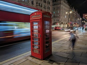 Close-up of telephone booth in city