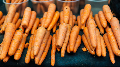 Stacked carrots. ready for sale. organic concept.