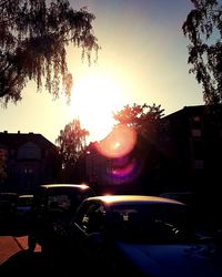 Silhouette of car at sunset