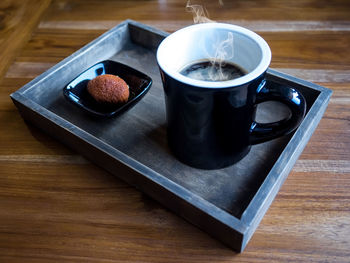 High angle view of coffee on table