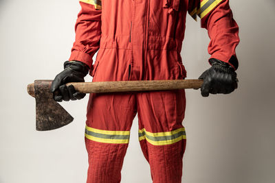 Rear view of person standing against white background