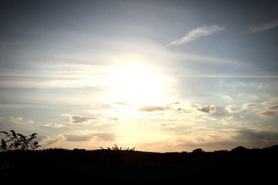 Silhouette landscape against sky during sunset