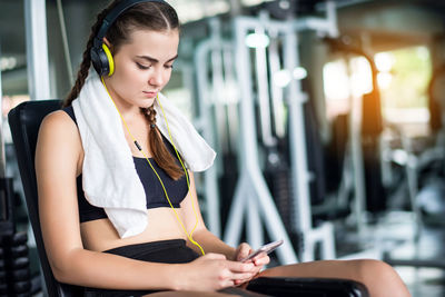 Young woman using mobile phone