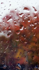 Close-up of water drops on glass