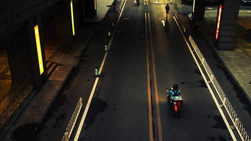 High angle view of vehicles on road in city