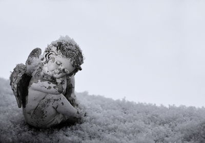 Close-up of children against clear sky