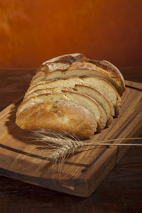 High angle view of bread on cutting board