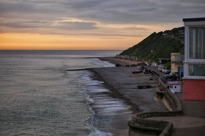 Scenic view of sea against sky during sunrise