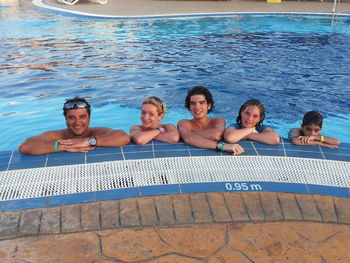 High angle view of people swimming in pool