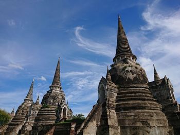 Low angle view of old temple building against sky