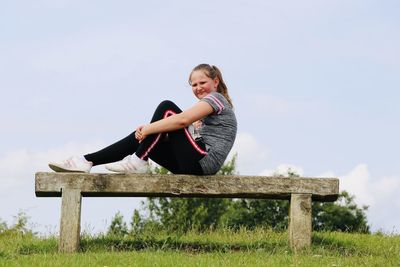 Woman sitting on bench