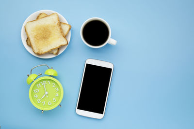 High angle view of coffee cup on table