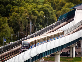 High angle view of metro train on bridge