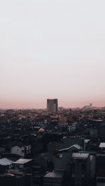 High angle view of townscape against sky during sunset