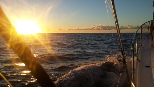 Sun shining over sea