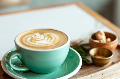 Cup of coffee on table