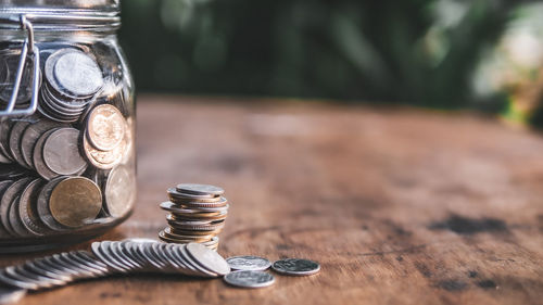 Close-up of coins on table