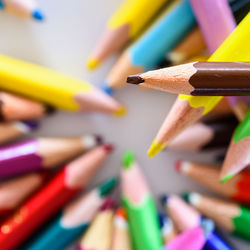 Close-up of colored pencils on table