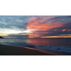 Scenic view of sea at sunset