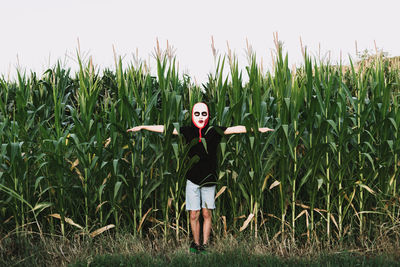 Woman standing in field