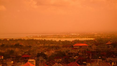 High angle view of townscape against sky during sunset