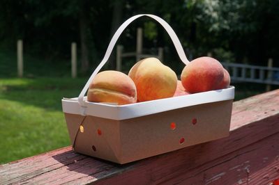 Close-up of apricots in basket